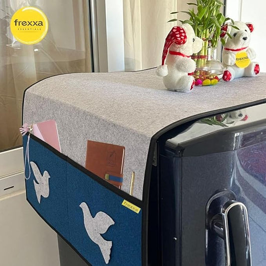 Fridge cover with frexxa logo, decorative items, and butterfly design.