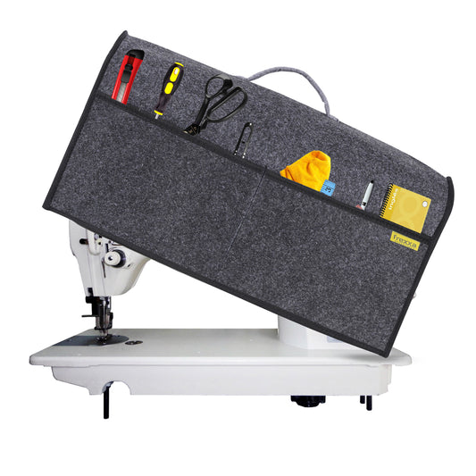 Sewing machine with a gray cover displaying various tools and accessories on a white background