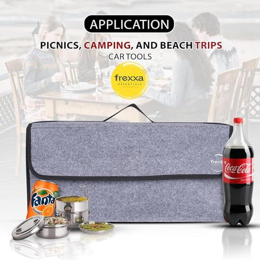 Gray car tool kit with Fanta, Coca-Cola, and snacks on a white background