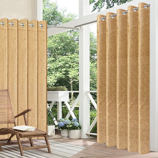 Beige outdoor curtains with grommets on a patio with a chair and plants.