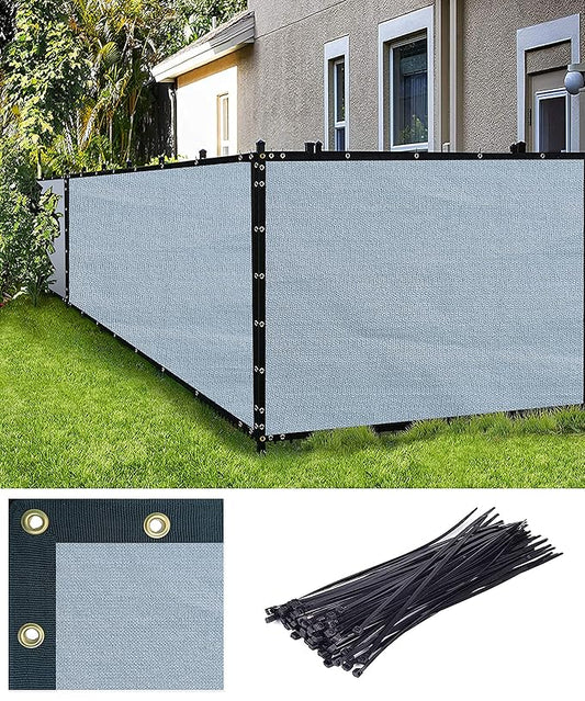 Privacy screen fence with installation hardware on a grassy area.