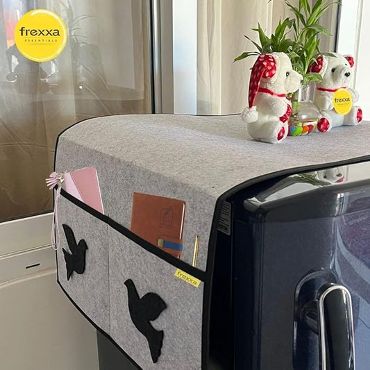 Gray fabric cover with butterfly designs on a kitchen counter, featuring frexxa branding.