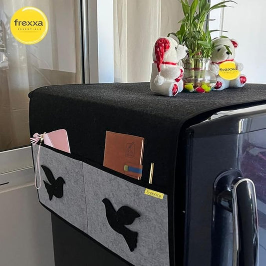 Black and gray fabric cover with pockets on a refrigerator, featuring frexxa branding.