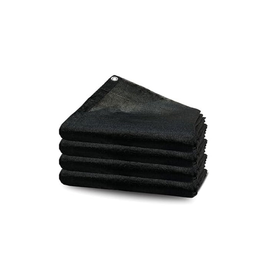 Stack of black towels on a white background