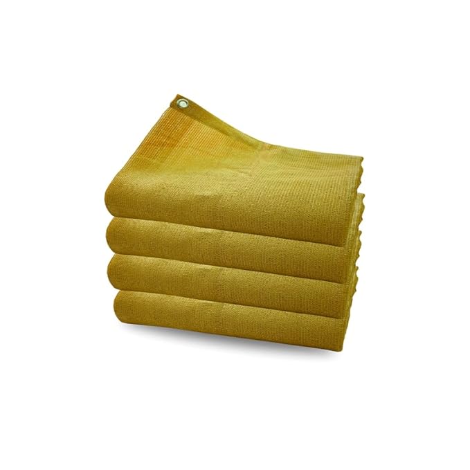 Stack of yellow folded cloths on a white background