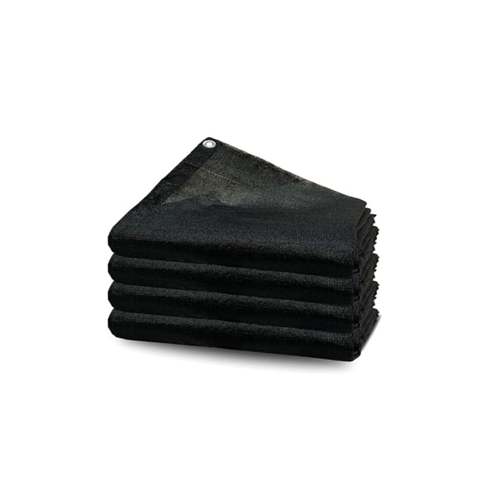 Stack of black towels on a white background