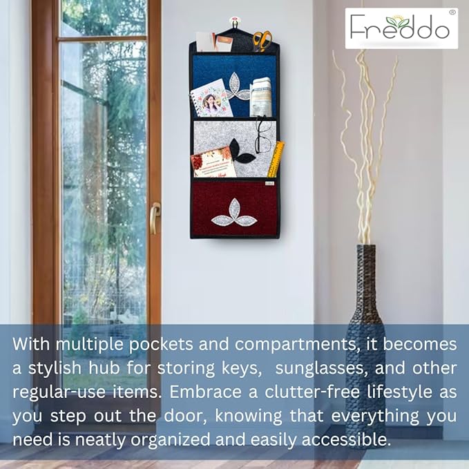 Wall-mounted organizer with multiple pockets and compartments, Freddo brand visible